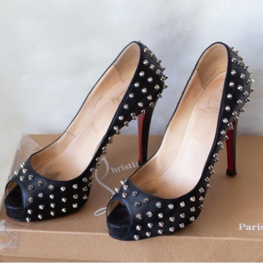 Christian Louboutin spiked black pumps